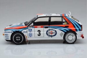 Lancia Delta HF Integrale Evoluzione #3 D. Auriol / B. Occelli Tour de Corse 1992 Kyosho 1:18 08348H Metall — bild 4 av 9