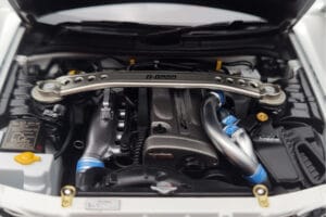 Nissan Skyline GT-R R34 Nismo Z-Tune Vit MotorHelix 1:18 M83407 Metall — bild 9 av 11