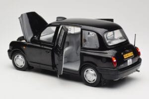 London Taxi TX1 Svart Sun Star 1:18 1120 Metall — bild 5 av 8