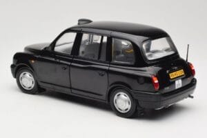 London Taxi TX1 Svart Sun Star 1:18 1120 Metall — bild 7 av 8