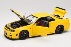 Nissan Skyline GT-R R34 Customized Version Gul MotorHelix 1:18 M83412 Metall — bild 2 av 8