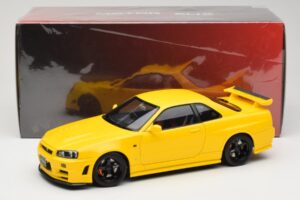 Nissan Skyline GT-R R34 Customized Version Gul MotorHelix 1:18 M83412 Metall — bild 8 av 8